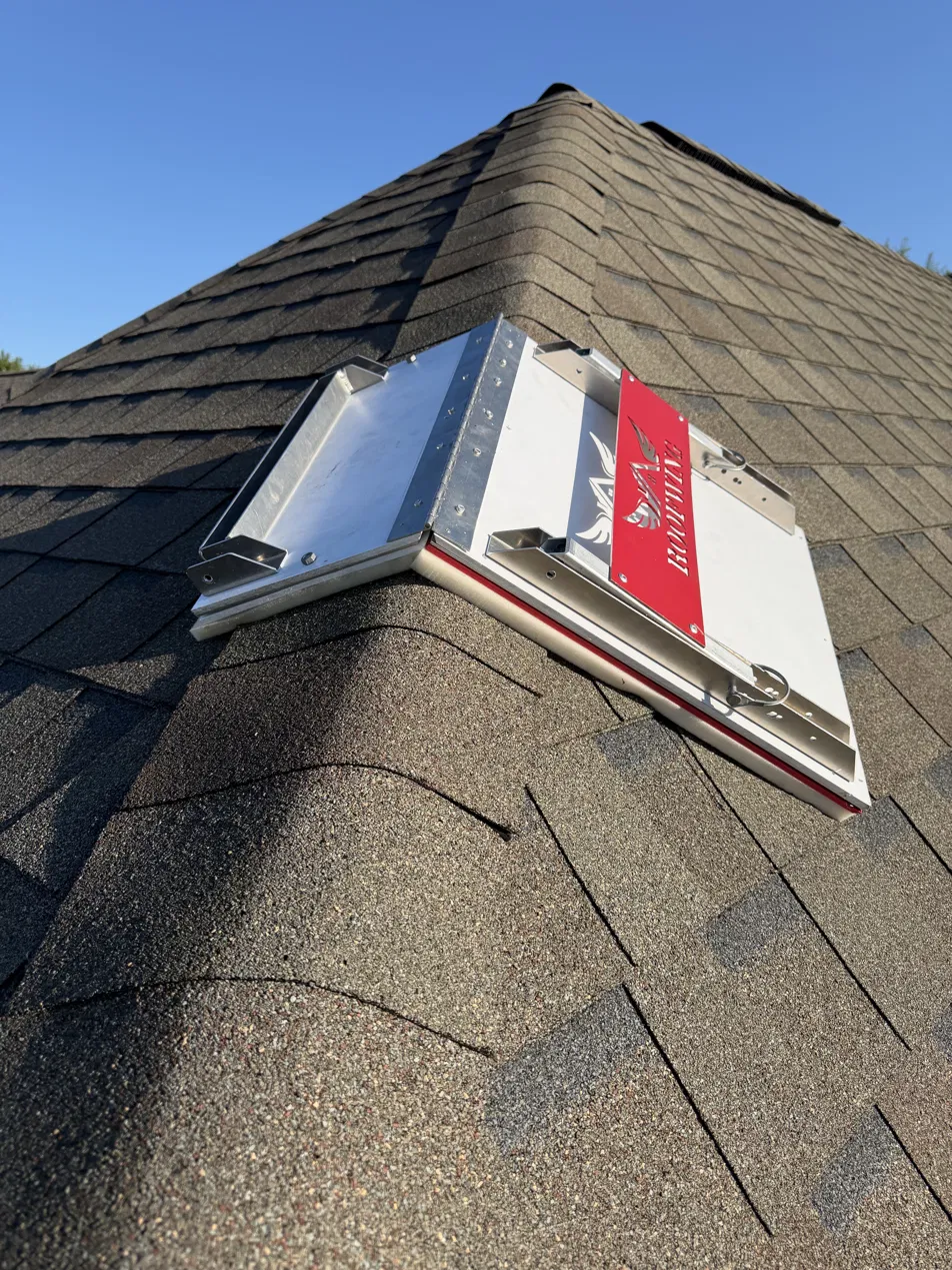 The Roofwing straddling a hip roof junction